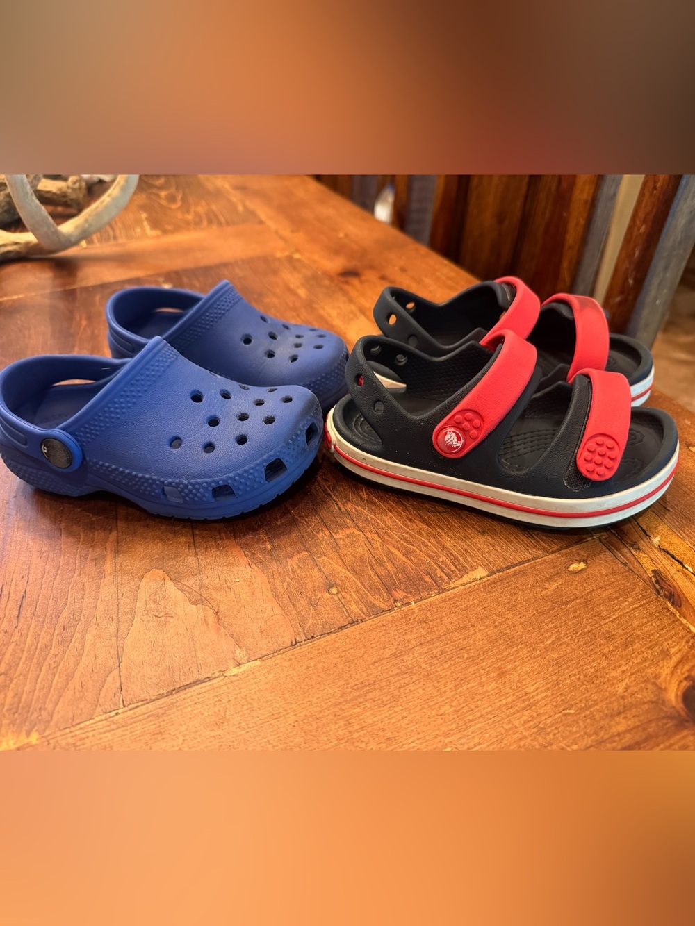 Crocs Kids Blue and Black/Red Slip-On Clogs